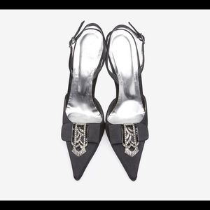 Stuart Weitzman black satin sling back. Size 6